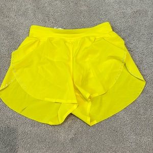 Lululemon yellow find your pace shorts